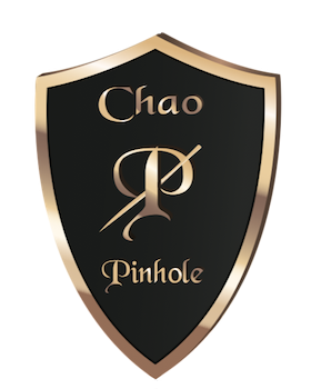 Chao Pinhole logo: black shield with gold lettering and stylized dental symbol.
